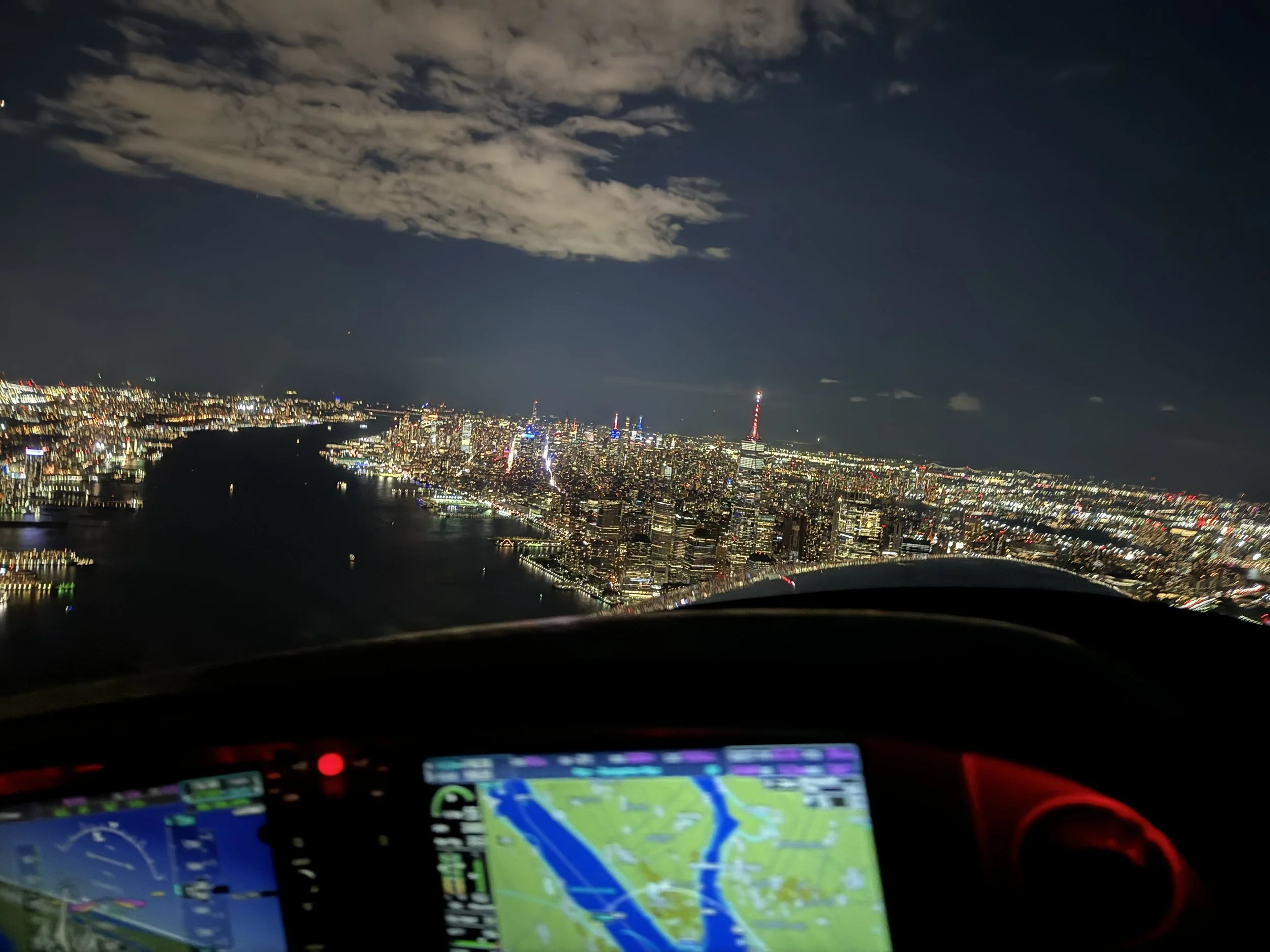 Flying over NYC at night